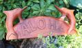 Aloha Schild mit Delfinen