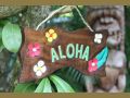 Vintage Aloha Schild mit Plumeria Blumen